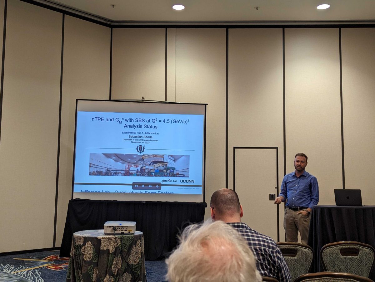 UConn graduate student Sebastian Seeds starts his talk.